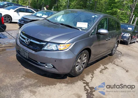 2014 Honda Odyssey Touring/Touring Elite z USA, uszkodzony, nr VIN 5FNRL5H97EB026053